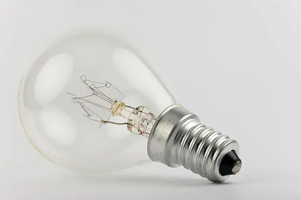 Old light bulb with artfully shaped filaments.
