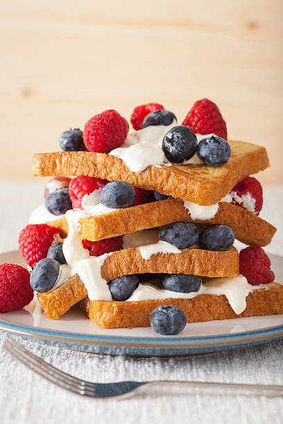 istock french toasts with creme fraiche and berries for breakfast 511803036
