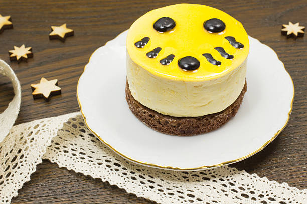 Cake on a saucer, stars and ribbons on the table