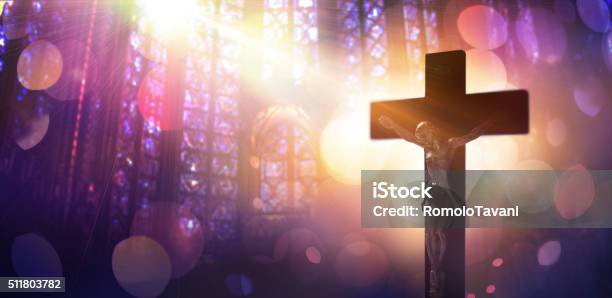 Crucified Christ Symbol Of Catholic Faith Stock Photo - Download Image Now - Catholicism, Praying, Church