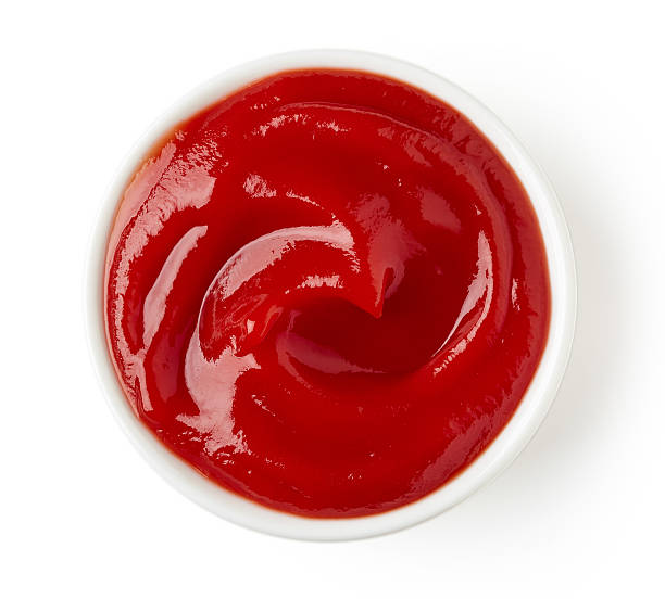 istock Ketchup or tomato sauce on white background 511807898