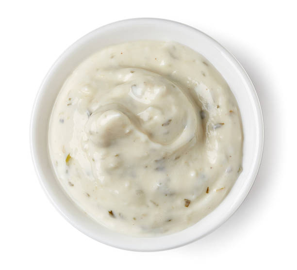 istock Garlic sauce  in round dish on white background 511808118