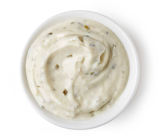 istock Mayonnaise in round dish on white background 511808140