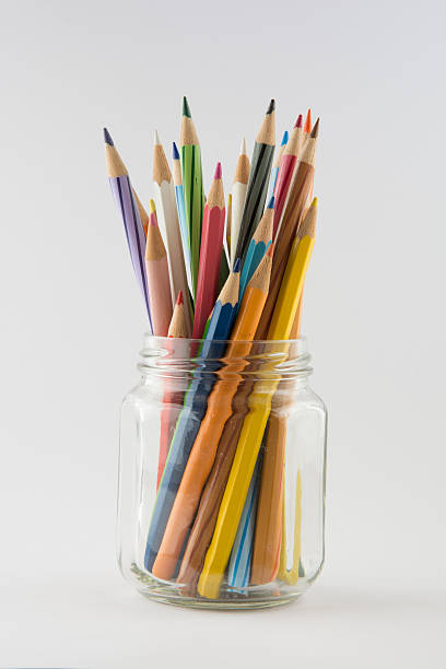 istock Coloured pencils in a glass jar 511808268