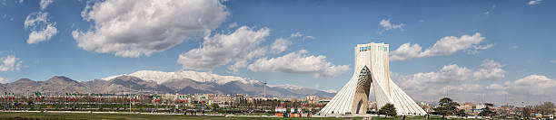Panorama Azadi Tower and Milad tower, Tehran Iran Huge Panorama of the Azadi Tower or The Freedom Tower of Tehran, and Milad tower in the distance, with the Alborz mountain range even further back, Tehran, Iran tehran stock pictures, royalty-free photos & images