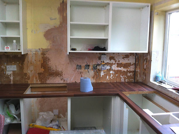 istock Image of new kitchen being fitted, kitchen fitters, worktop, cabinets 511809945
