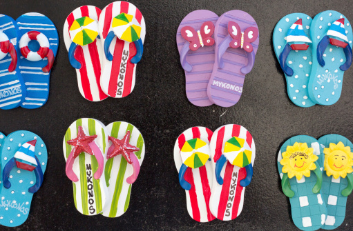 Fridge magnets denoting flip flops or slops in Mykonos and the rest of the Cycladic islands