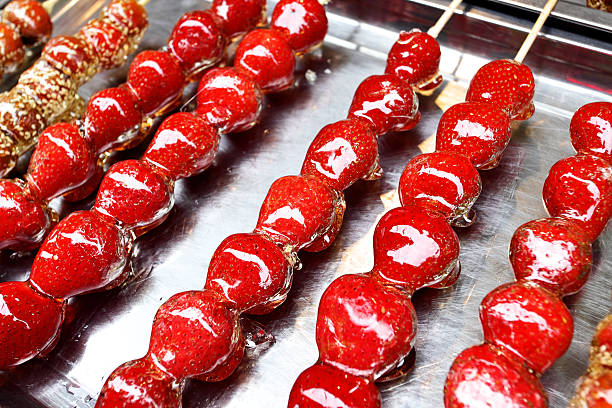 istock Tray with candied strawberry 511810284