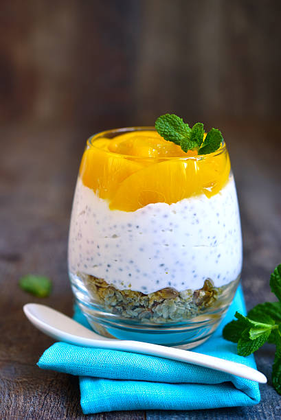istock Chia pudding with oat and peach slices. 511812332