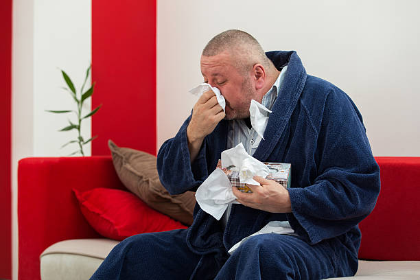 갖는 내한성이 남자 - tissue box flu virus kleenex 뉴스 사진 이미지