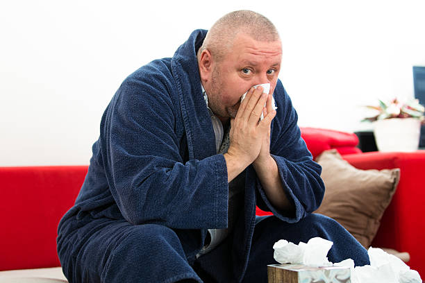 갖는 내한성이 남자 - tissue box flu virus kleenex 뉴스 사진 이미지