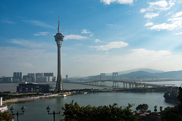 istock Macau tower and sai van bridge in evening at macau 511813304