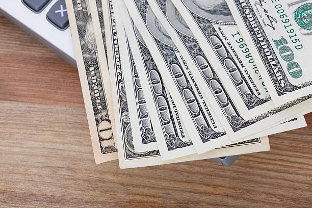 istock Money on wooden table background 511813532
