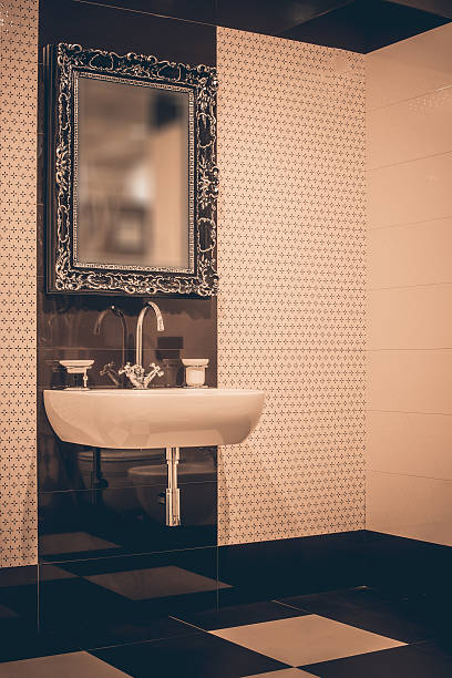 istock Washbasin and mirror in bathroom 511813736