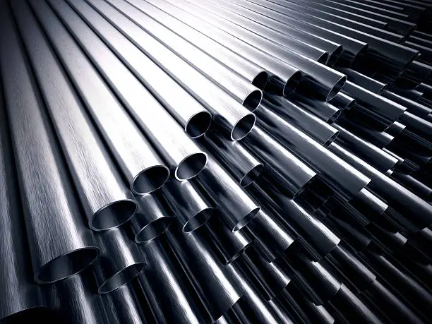 A stack of steel metal tubes with shiny reflections on them