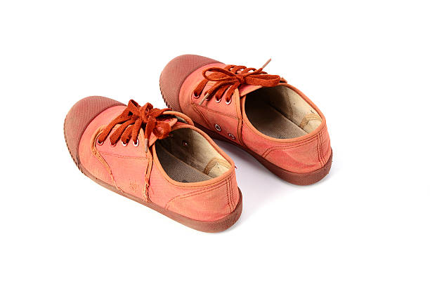 istock Brown sneakers, Isolated on white background 511852198