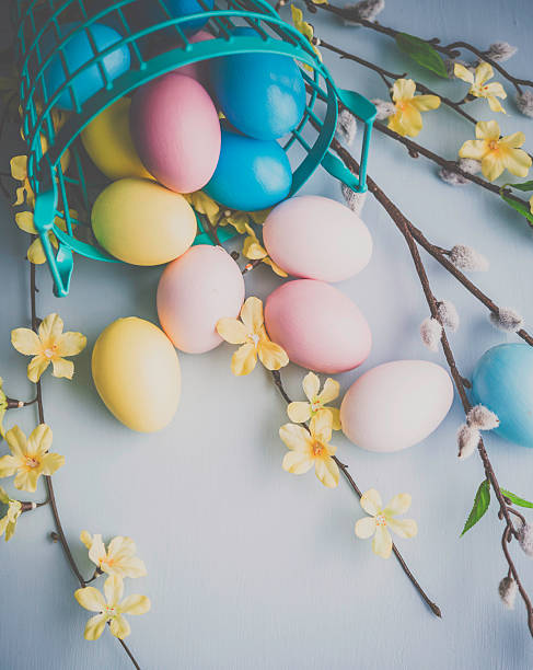 istock Easter arrangement with painted eggs, blossoms and pussy willow 511856250