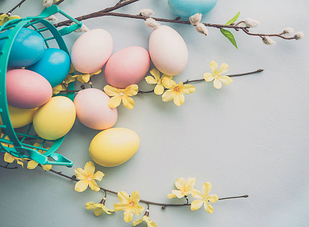 istock Easter arrangement with painted eggs, blossoms and pussy willow 511856642