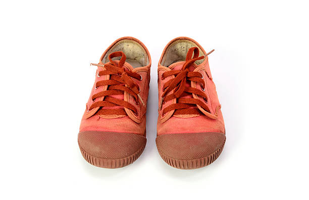 istock Brown sneakers, Isolated on white background 511857760