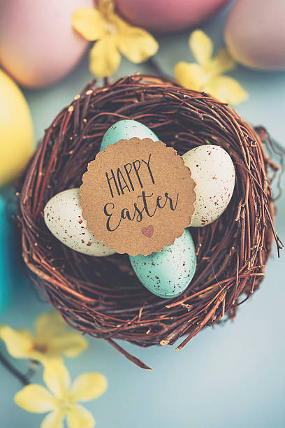 istock Easter arrangement with painted eggs and blossoms 511858876