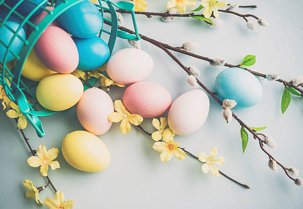 Easter arrangement with painted eggs, blossoms and pussy willow