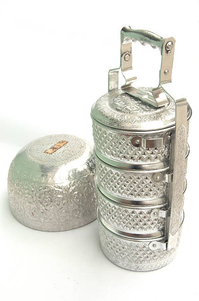 istock Metal tiffin carrier and silver bowl 511860452
