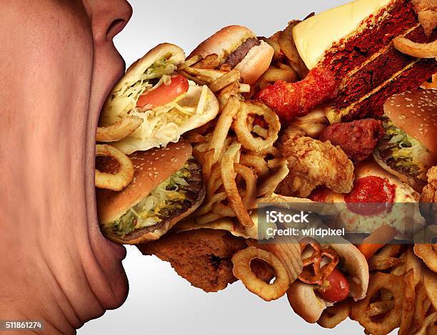 Eating Junk Food Stock Photo - Download Image Now - Over Eating, Food, Eating