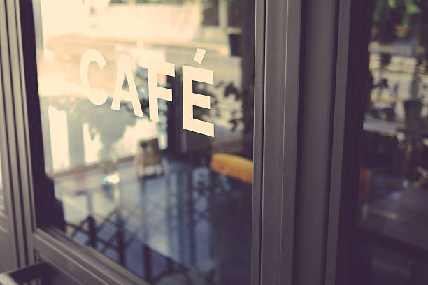 Alphabet cafe word on the window vintage color Alphabet cafe word on the window vintage color restaurant window stock pictures, royalty-free photos & images