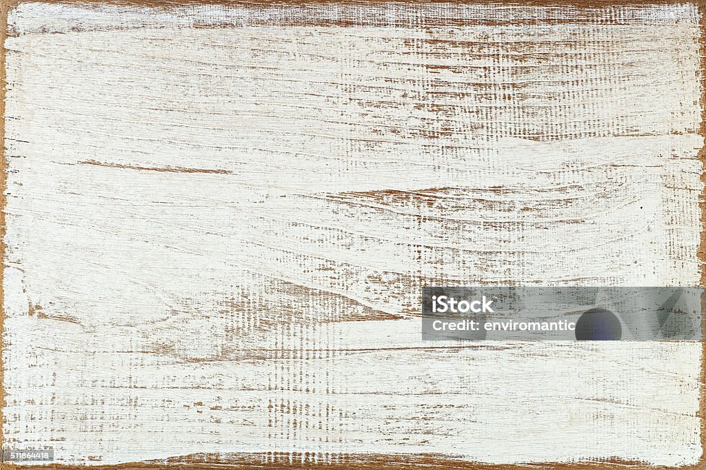 Old white wooden board background. Old painted white wooden board background with worn edges. Wood - Material Stock Photo