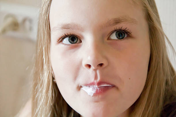 istock Eating cute girl 511864433