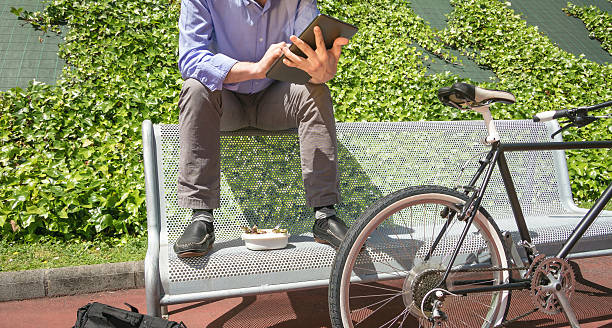 istock Young business man working with electronic tablet in lunch break 511864937