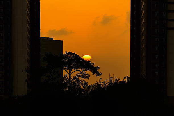 istock Beautiful sunset between of two office buildings. 511867338