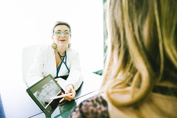 istock Mature Female Doctor Using A Digital Tablet For His Diagnosis. 511867610