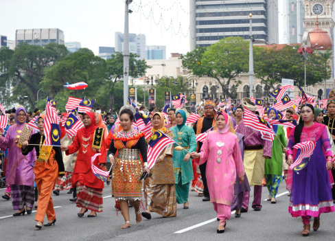 Kuala Lumpur, Malaysia - August 31, 2014: Multi-ethnic group with traditional costumes  during 57th celebration of Malaysia Independence Day in Kuala Lumpur, Malaysia.