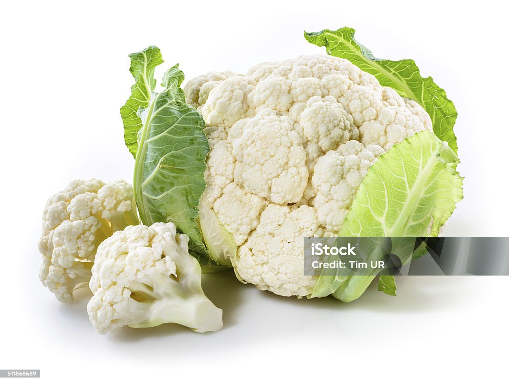 Fresh cauliflower with pieces isolated on white Cauliflower Stock Photo