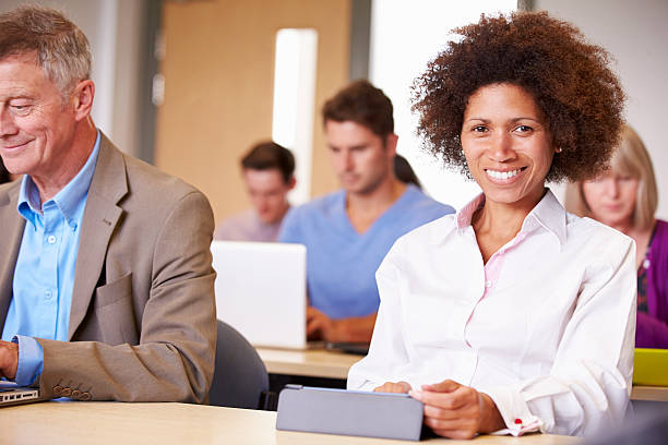 istock Mature Students In Further Education Class 511869857