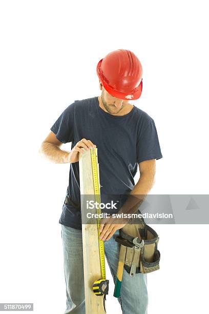 Carpentier Man Measuring Wood Stock Photo - Download Image Now - Adult, Adults Only, Belt