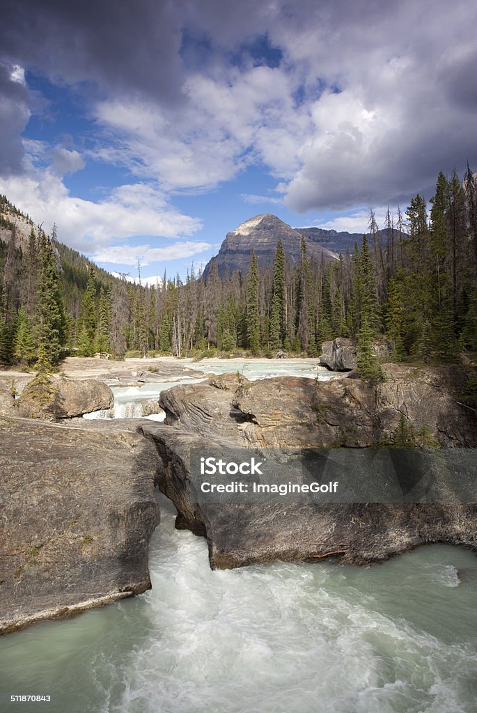 Waterfall in the Canadian Rockies A beautiful waterfall in the Canadian Rockies. Lake Louise, Alberta. Banff National Park. Alberta Stock Photo