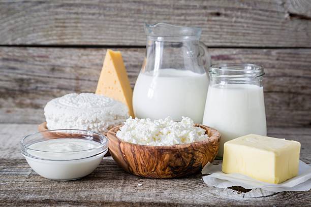istock Selection of dairy products on rustic wood bacground 511871322