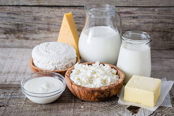 istock Selection of dairy products on rustic wood bacground 511871334