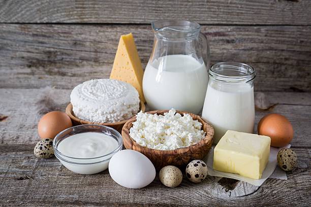 istock Selection of dairy products on rustic wood bacground 511871366