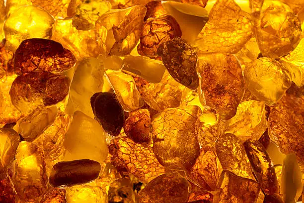 closeup baltic amber stones rectangular lie on a flat surface