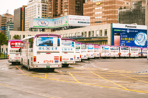 Taipei, Taiwan - February 2, 2016: Buses neatly lined and parked at Taipei West Bus Station Terminal in Taiwan
