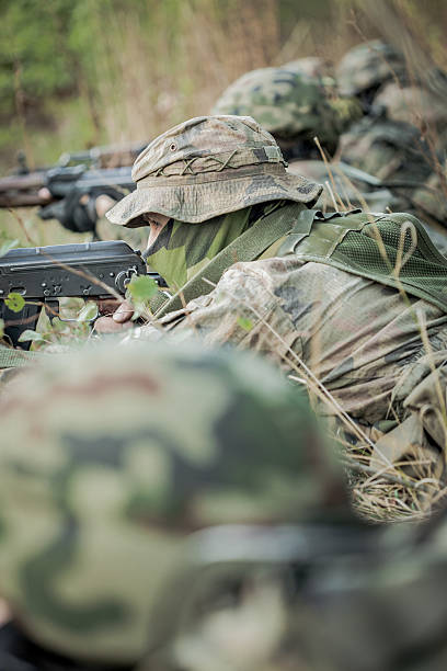 istock Soldiers training in the forest 511872806