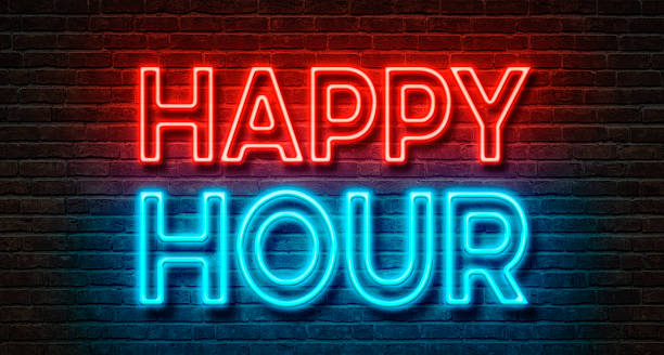 Neon sign on a brick wall - Happy Hour Neon sign on a brick wall - Happy Hour bar drink establishment stock pictures, royalty-free photos & images