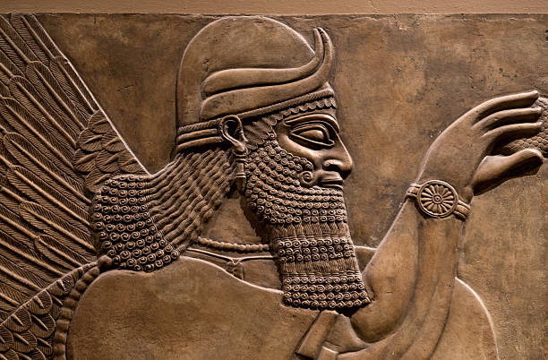 Ancient relief of an assyrian god
