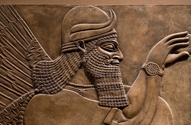 Photo of Ancient relief of an assyrian god