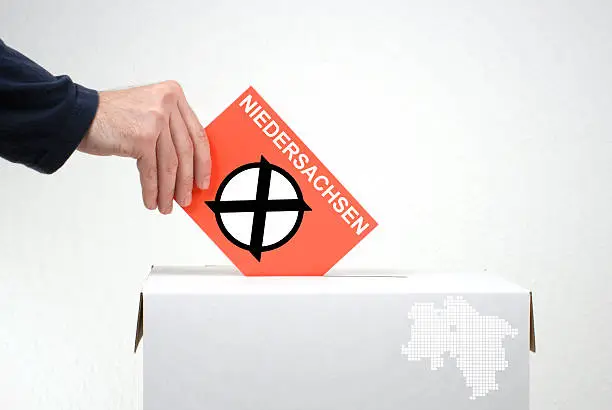 Elections in german region Niedersachsen - Ballot Box and red envelope