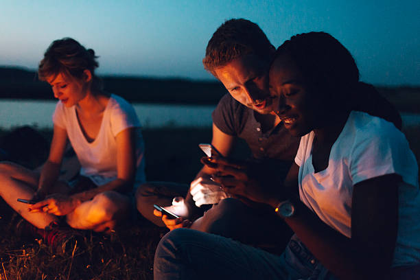 istock Friends camping together in nature 511877548