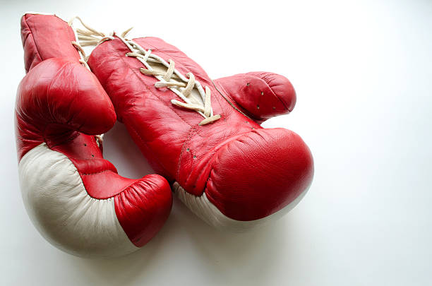 istock old red and white boxing gloves 511878748